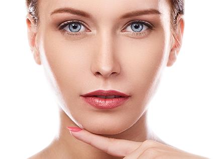 a close up of a woman looking at the camera